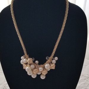 Goldtone and pearl Knotted necklace with earrings.